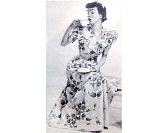 A 96cm 38" bust size vintage 1950s double breast front button closure and short sleeve house coat / dressing gown /robe sewing pattern.