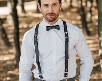 Black leather suspenders for wedding mens outfit. Bracers and bow tie set for men. Custom leather suspenders