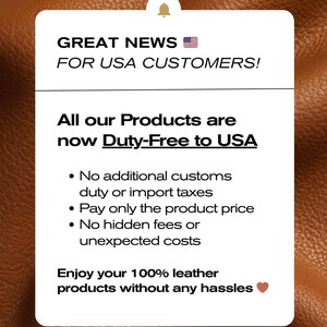 The image is a sign that announces that all products are now duty-free to USA, with no additional customs duties, import taxes, or hidden fees. It also mentions that customers can enjoy 100% leather products without any hassles.