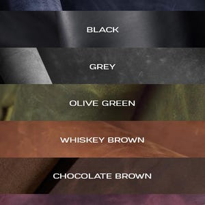 a bunch of different colors of leather on a table