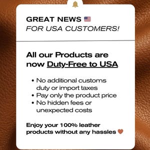 The image is a sign that announces that all products are now duty-free to USA, with no additional customs duties, import taxes, or hidden fees. It also mentions that customers can enjoy 100% leather products without any hassles.