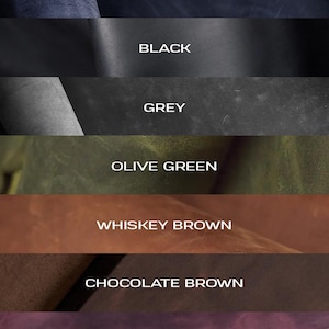 a bunch of different colors of leather on a table