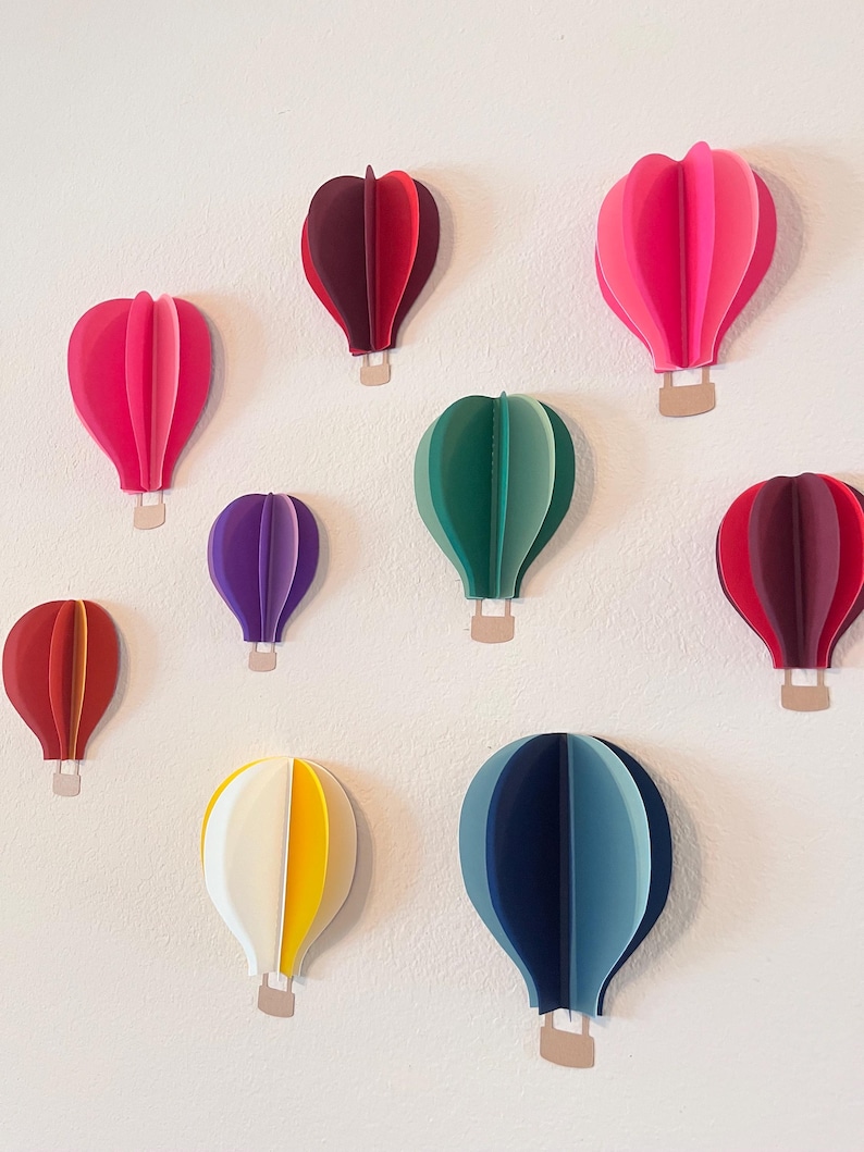 3D paper hot air balloons in custom colors.