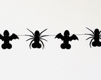 May include: Black and white Halloween party garland with bats, spiders, and bones.