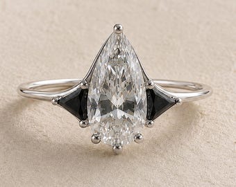 Moissanite Elongated Pear with Black Side Stones Engagement Ring
