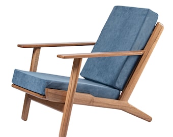 hardwood lounge chair with footrest "Denmark" | oak, walnut |, large selection of fabric types and colors.