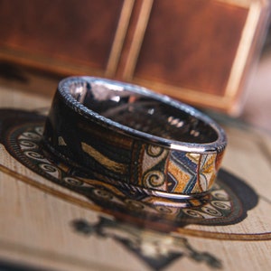 Mens Wedding band in Damascus Steel and Robin Hood Card Deck from KingsWildProject luxury playing cards.