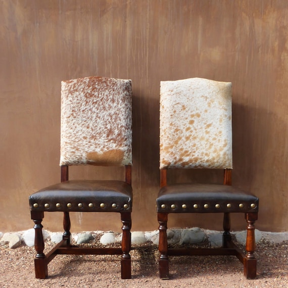 Cowhide covered chairs hot sale