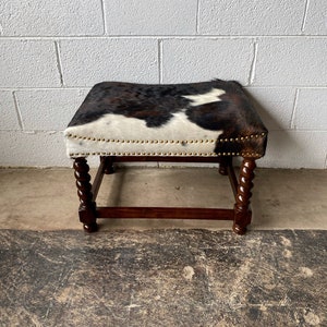 Barley Twist Cowhide Ottoman - Dark Brown + Tan and White. Always sells out!