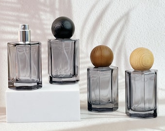 50 ml svarta glasflaskor med parfymförstärkare, tomma spraybehållare, återfyllningsbara doftspraybehållare med naturligt trälock