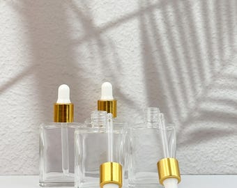Elegante frasco gotero de vidrio transparente de 15 ml con tapa dorada: perfecto para aceites esenciales, cuidado de la piel casero, almacenamiento decorativo, reutilizable y a prueba de fugas.