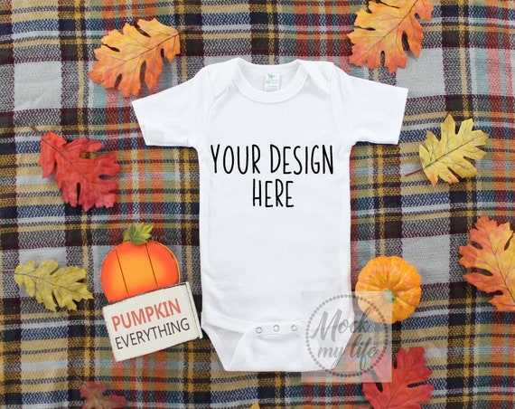 Laughing Giraffe White Bodysuit Mockup Flat Lay Mockup