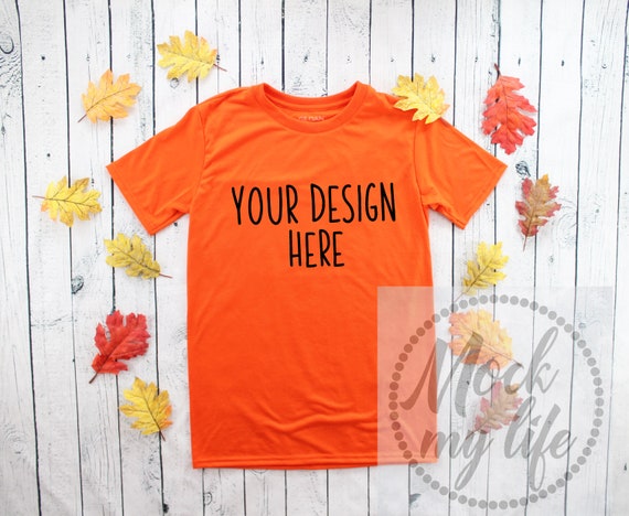 Gildan 42000 Orange Fall Styled Flat Lay Mockup Gildan 42000 Orange Fall Styled Flat Lay Mockup