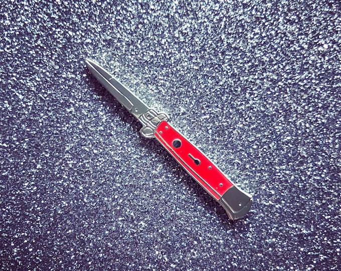 Red & Silver Switchblade Pin