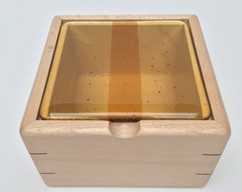 Maple jewellery box with amber glass lid