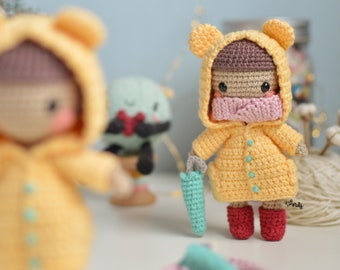 Knitting pattern-guide in SPANISH/ENGLISH to make a doll with a raincoat and umbrella. Martina amigurumi doll, crochet raincoat