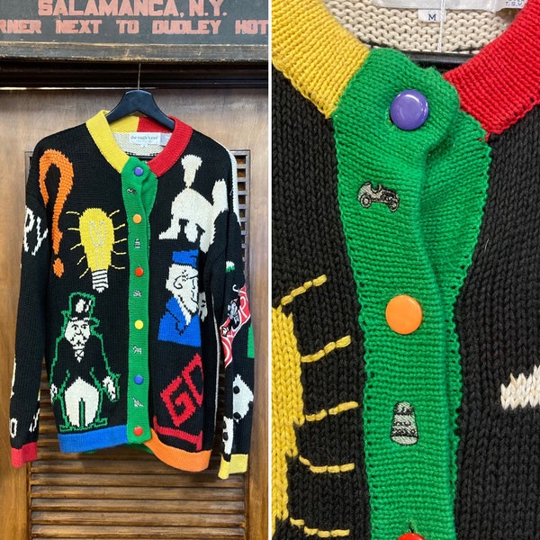 Vintage années 1990 « Eagle’s Eye » Monopoly Game Cardigan Sweater, Cardigan des années 90, Pull des années 90, Pop Art des années 90, Jeu de société, vêtements vintage