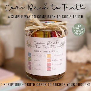 May include: A glass jar with a gold ribbon and the words "Come Back to Truth." The jar contains colorful cards and a label with phrases like "When you feel... overwhelmed." The image also includes the text "60 Scripture + Truth Cards."