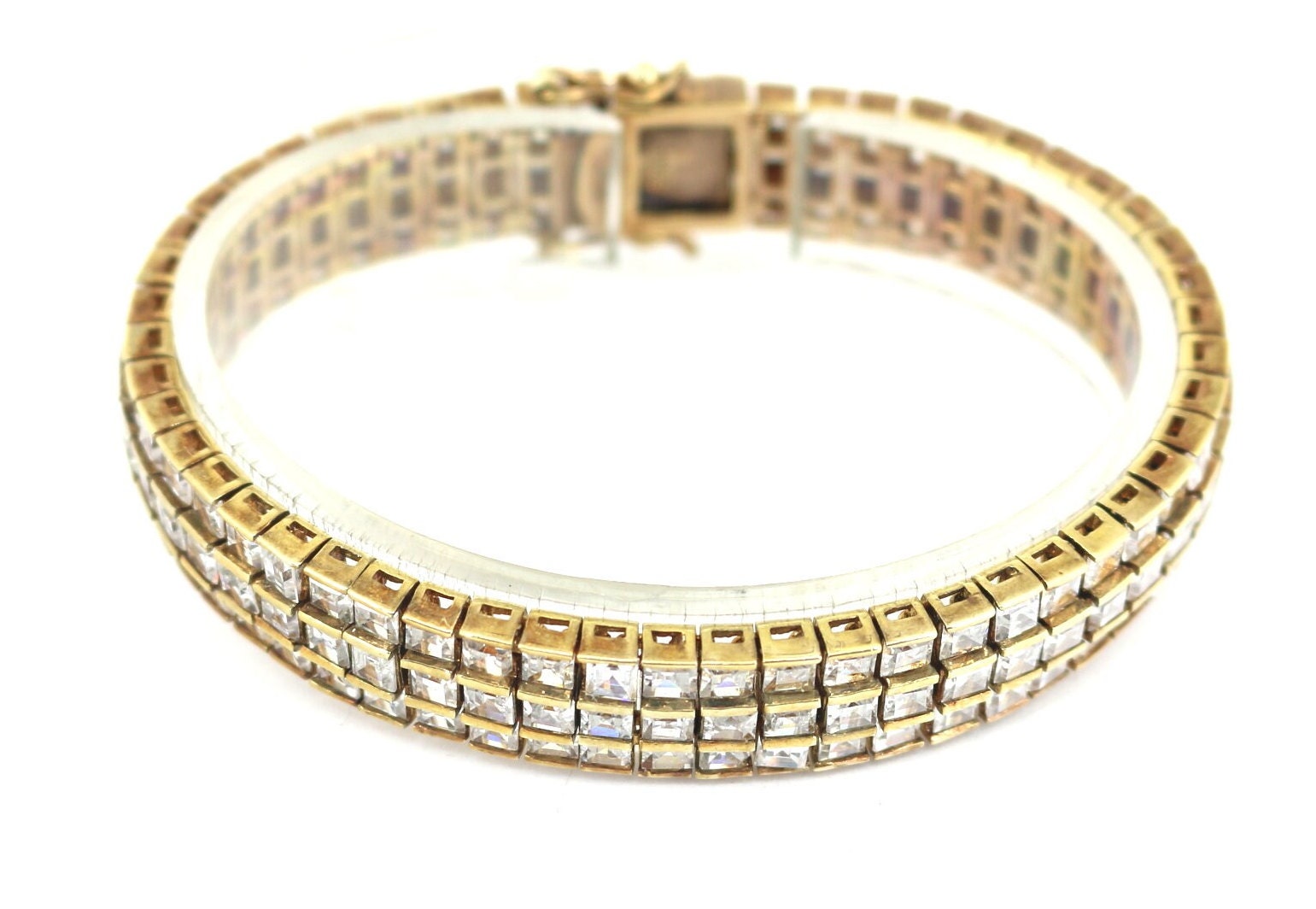 Vintage 7.5 in Triple CZ Crystals Gold Plated Tennis