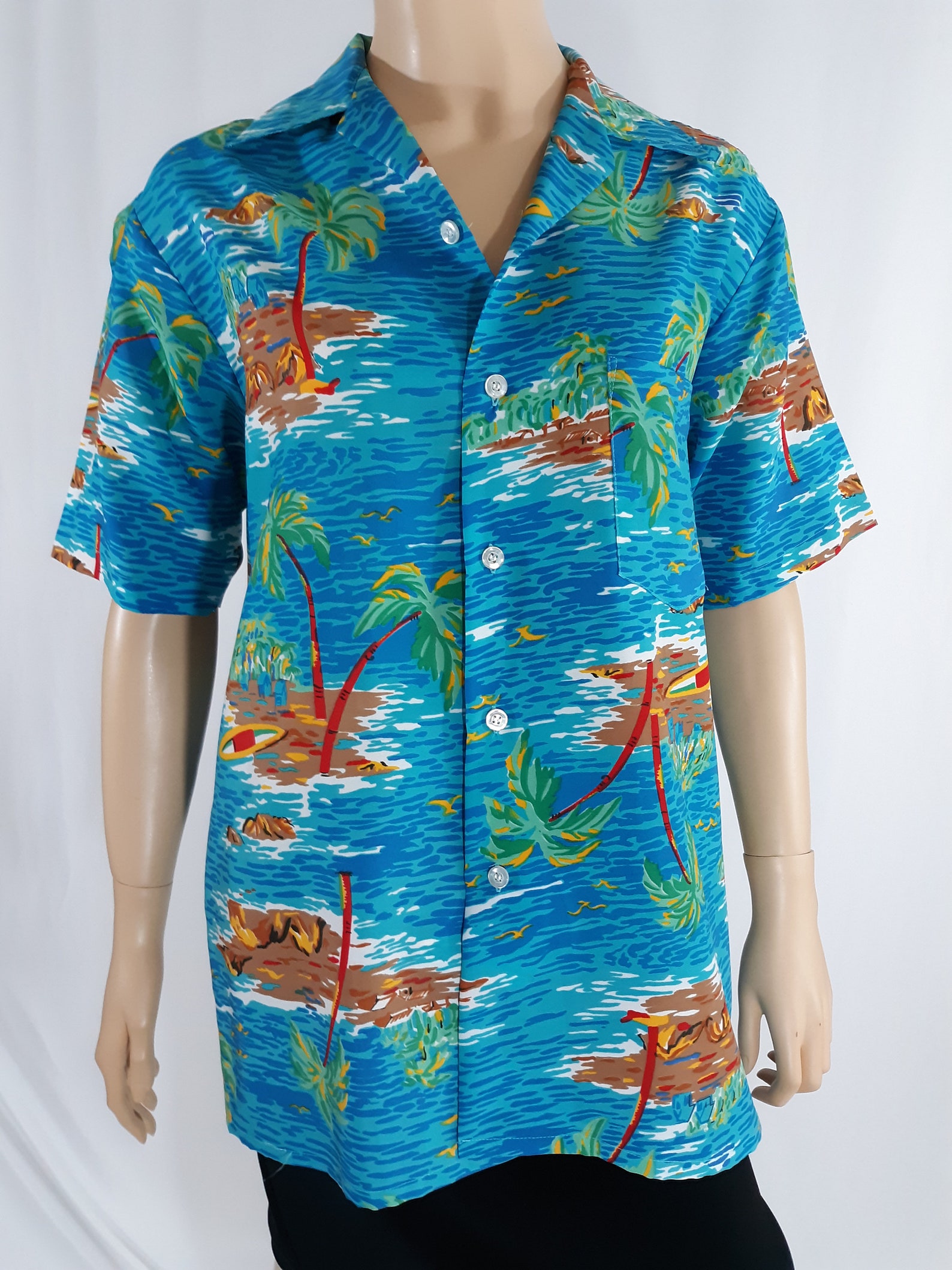 blue shirt with palm trees