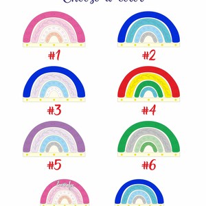 May include: A selection of rainbow-shaped designs in various colors, including pink, blue, red, green, and purple. Each rainbow has a unique pattern and is labeled with a number. The text "Choose a color" is at the top.