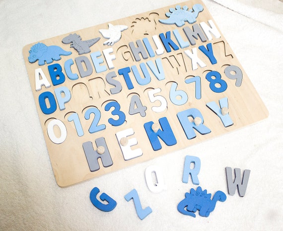 Dinosaur-themed alphabet name puzzle that cleverly weaves A-Z learning into a personalized dino world — a concept twist that makes it feel genuinely different from plain name puzzles.