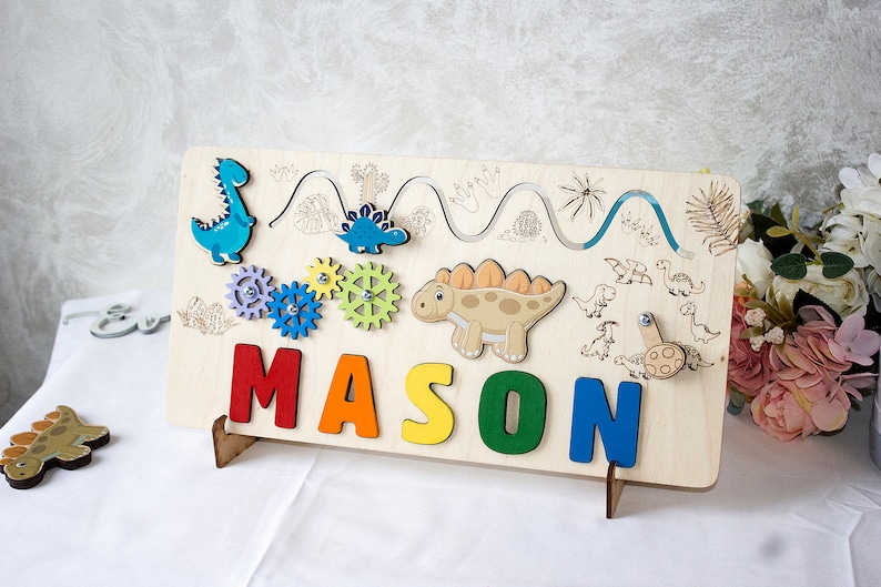 Dinosaur Montessori Puzzle Board, Personalized Baby Name Puzzle, Wooden Busy Board, Shower Gift, First Christmas Gift, Sensory Activity Toys image 1