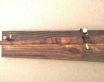 Simple Dark Pine Wand with stand
