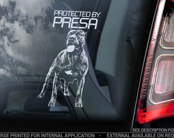 May include: White vinyl sticker with a black and white image of a dog and the text "PROTECTED BY PRESA".