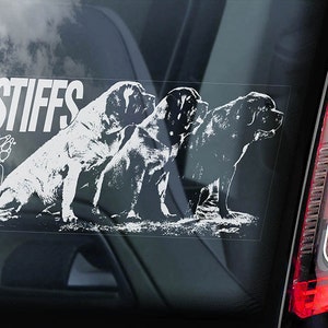 Op de afbeelding: Witte vinyl sticker met de tekst "MASTIFFS ON BOARD" en een pootafdruk. De sticker toont drie witte silhouetten van Mastiff-honden.