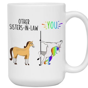 May include: White ceramic mug with a humorous illustration comparing other sisters-in-law to a horse and the best sister-in-law to a unicorn. The text reads "Other Sisters-in-Law" and "You!"