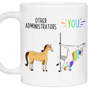 May include: White ceramic coffee mug with a humorous illustration comparing other administrators to a horse and the user to a unicorn. The text reads "Other Administrators" and "You".