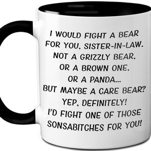 May include: White ceramic mug with a black handle and interior. The mug features the text "I WOULD FIGHT A BEAR FOR YOU, SISTER-IN-LAW..." in black, humorous text. A fun gift idea for a sister-in-law.