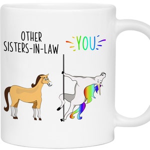 May include: White ceramic mug with a humorous illustration of a unicorn and a horse. The text reads "Other Sisters-in-Law" and "You".