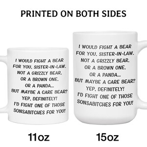 May include: Two white ceramic mugs with black text that reads "I would fight a bear for you, sister-in-law." The mugs are 11oz and 15oz. The text "Printed on both sides" is at the top.