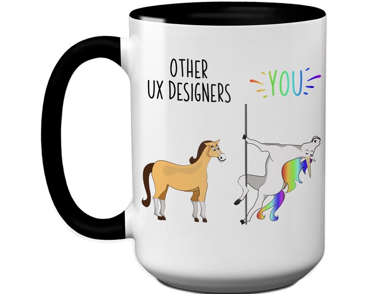 May include: White ceramic mug with a black handle and interior. The mug features a humorous design with the text "OTHER UX DESIGNERS" and "YOU" with a cartoon horse and unicorn. The unicorn has a rainbow mane and tail.
