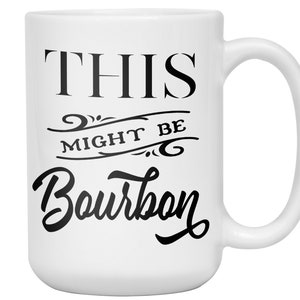 Puede incluir: Taza de cer&aacute;mica blanca con asa curvada. La taza presenta el texto "THIS MIGHT BE Bourbon" en negro, con letras estilizadas. La taza est&aacute; dise&ntilde;ada para bebidas y es adecuada para uso dom&eacute;stico o de oficina.