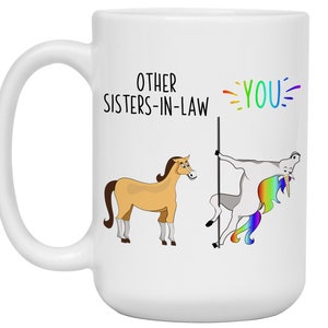 May include: White ceramic mug with the text "Other Sisters-in-Law" and "You" with a cartoon horse and unicorn illustration. The unicorn is holding a pole and has a rainbow mane and tail.