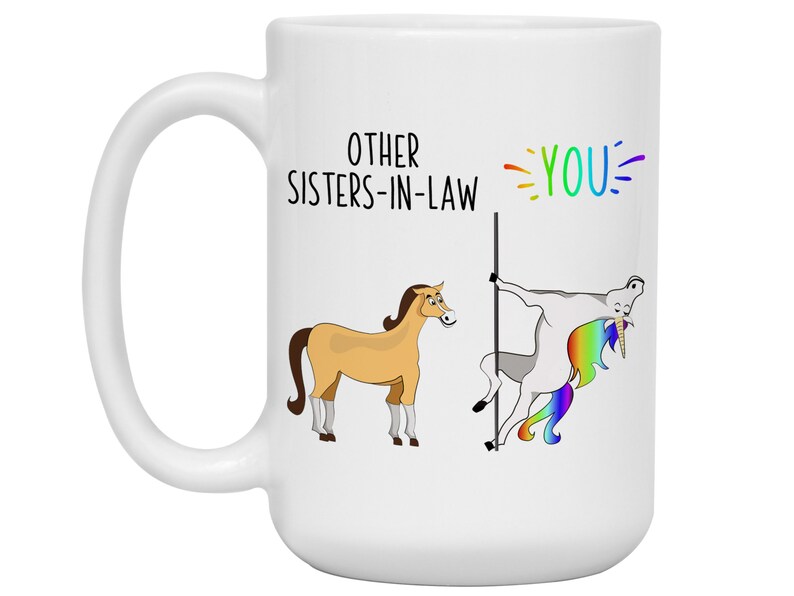 May include: White ceramic mug with the text "Other Sisters-in-Law" and "You" with a cartoon horse and unicorn illustration. The unicorn is holding a pole and has a rainbow mane and tail.