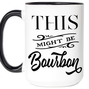 Puede incluir: Taza de cer&aacute;mica blanca con asa y borde negros. La taza presenta el texto "THIS MIGHT BE Bourbon" en letras negras. Un art&iacute;culo divertido para caf&eacute; o t&eacute;.