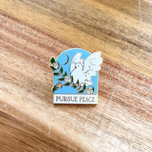 Pursue Peace 2022 convention enamel pin