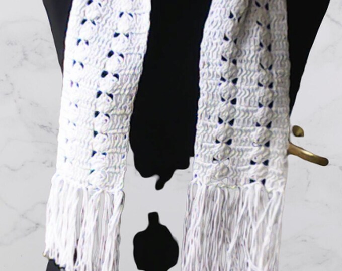 Long crocheted white scarf with fringes