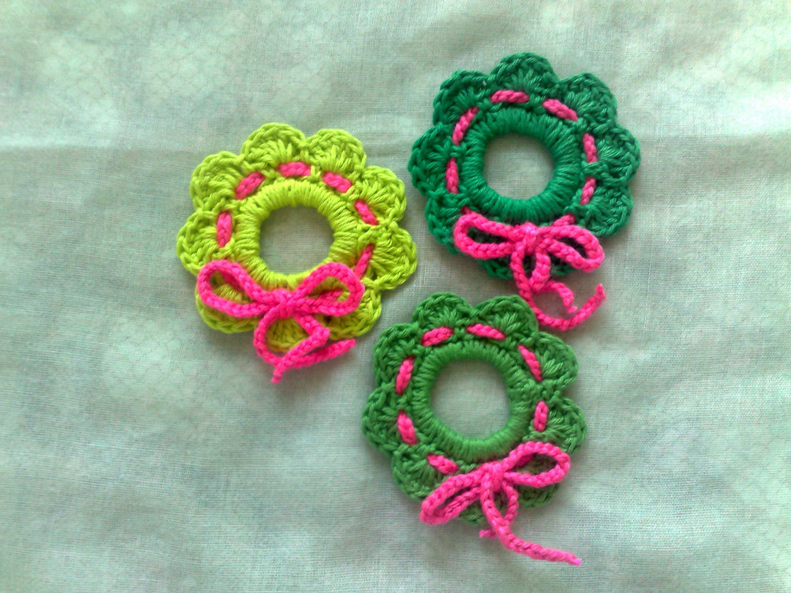 Crochet Christmas wreath hanging tree hanging in three different shades ...