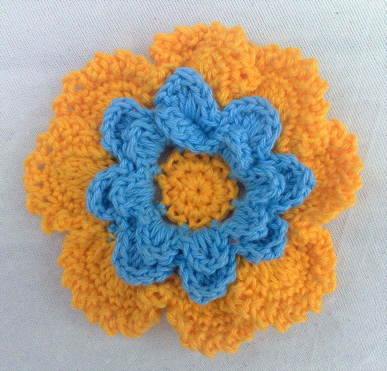 Appliqu\u00e9s of hand crocheted flower colors yellow and blue cotton 3.5 inches