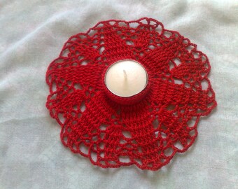 Crocheted red tealight holder for a romantic table decoration