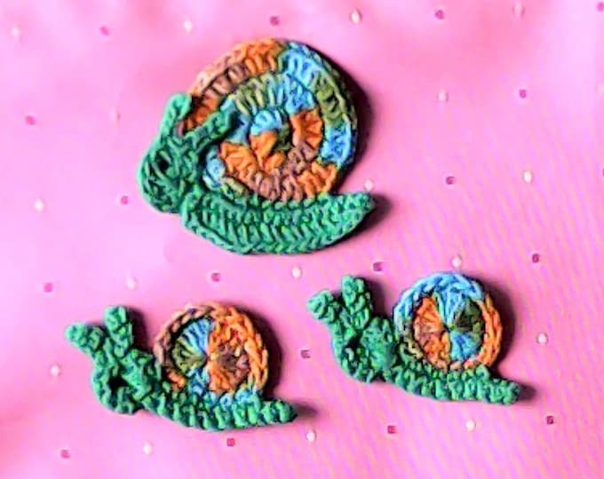 Crocheted applique snail 3 piece crochet application Closer crocheted in colorful gradient yarn
