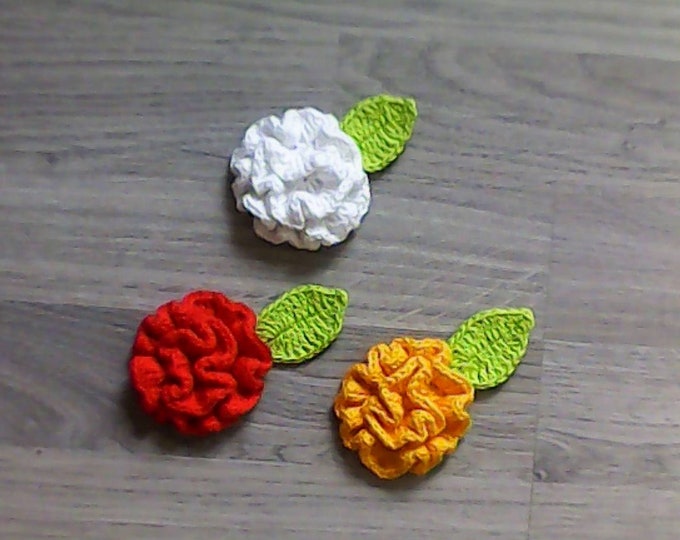 3 carnations crocheted in red, yellow and white with a sheet of applique for cardmaking 2.5 inches