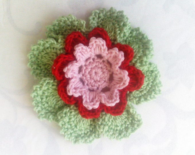 Hand crocheted flower in colors of light green, red and light pink size 3.5 inches