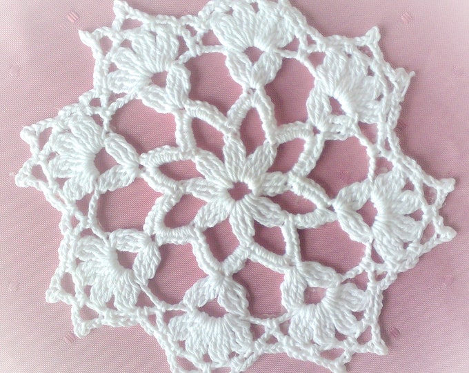 Crocheted snow crystal for the Christmas tree 5.3"