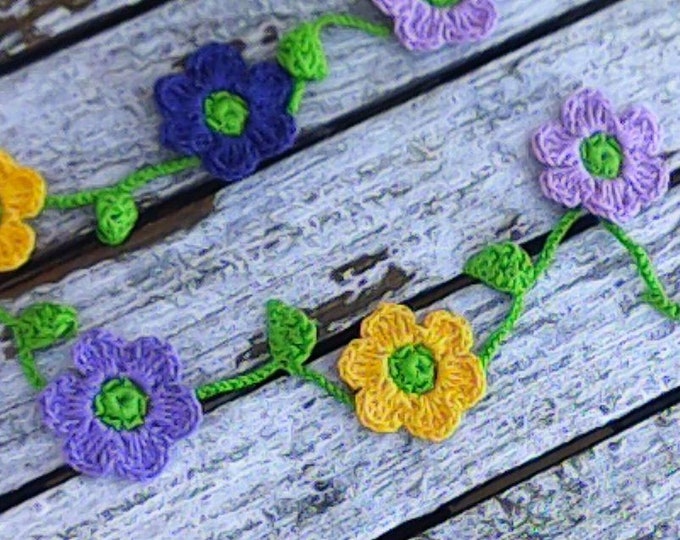 Crochet mini garland with 10 small colorful flowers yellow purple